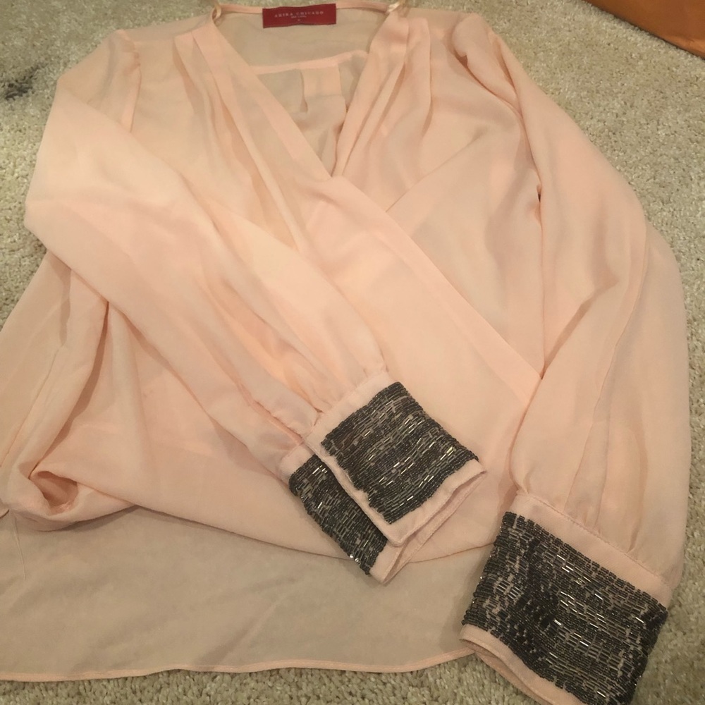 Gorgeous faux wrap high low Akira embellished top!